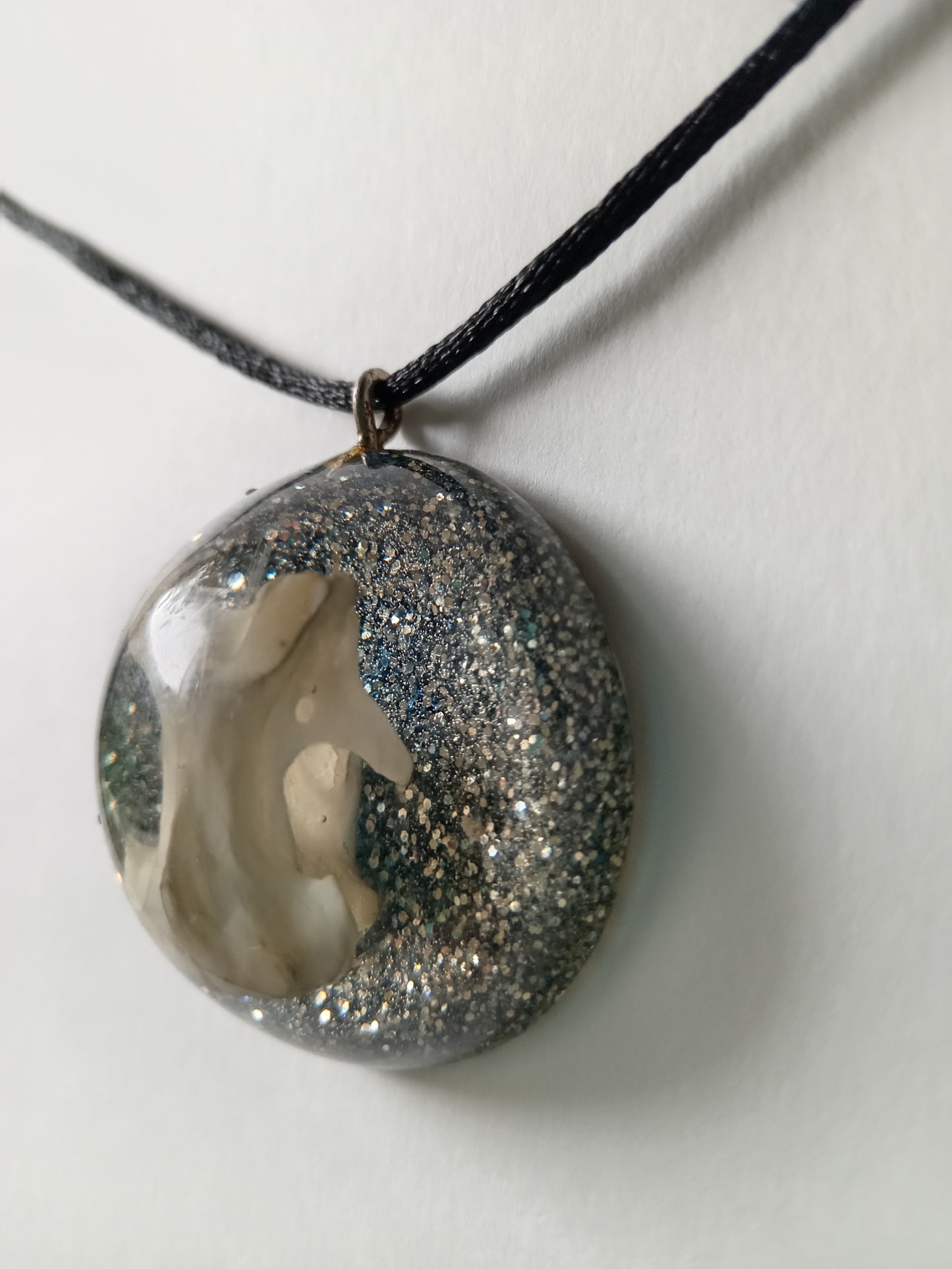 Bone and Glitter Resin Pendant