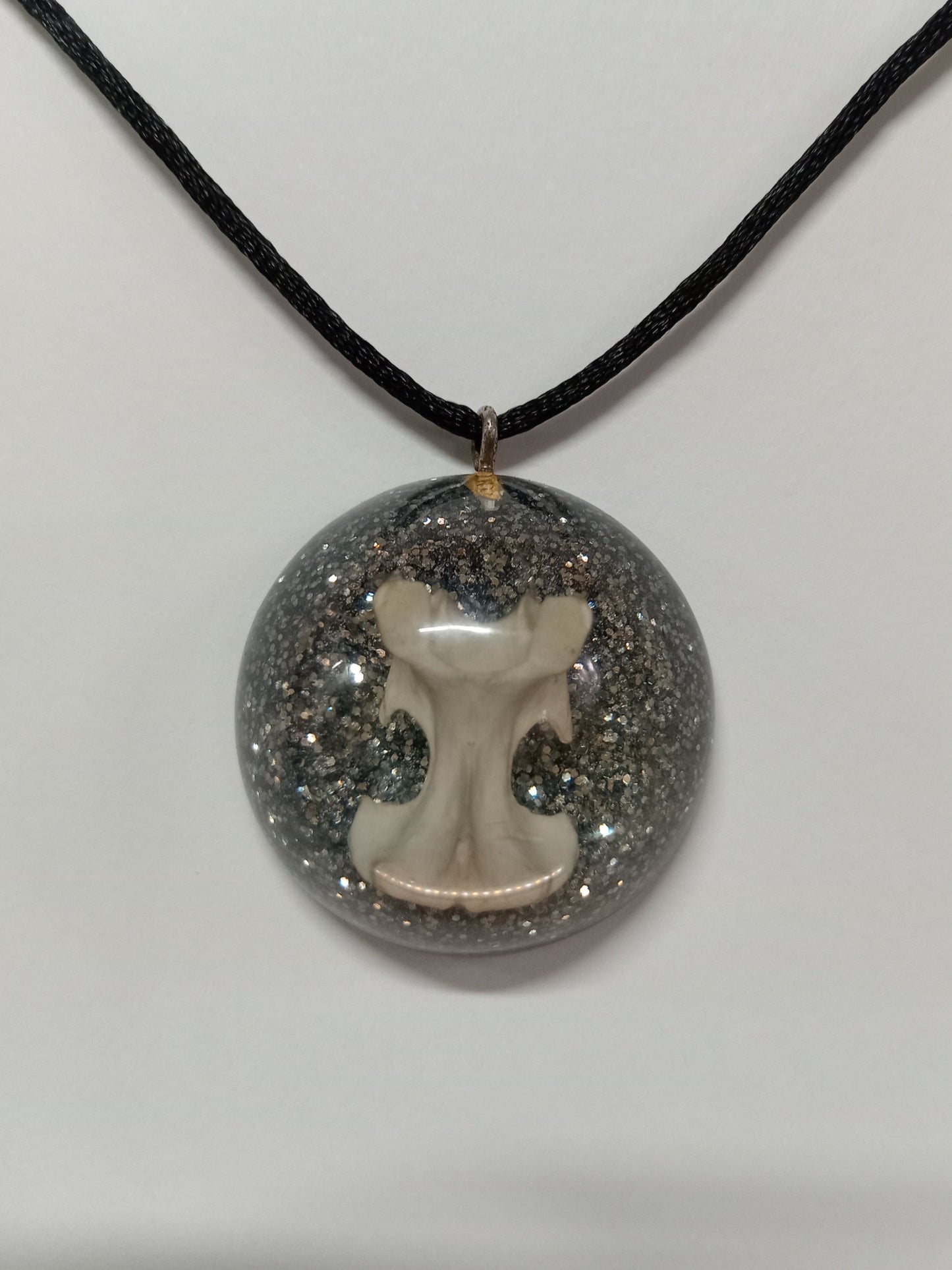 Bone and Glitter Resin Pendant