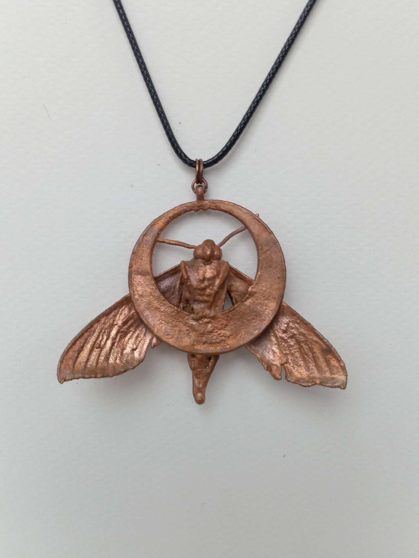 Detail shot of copper electroformed moth, natural patina, one-of-a-kind wearable art